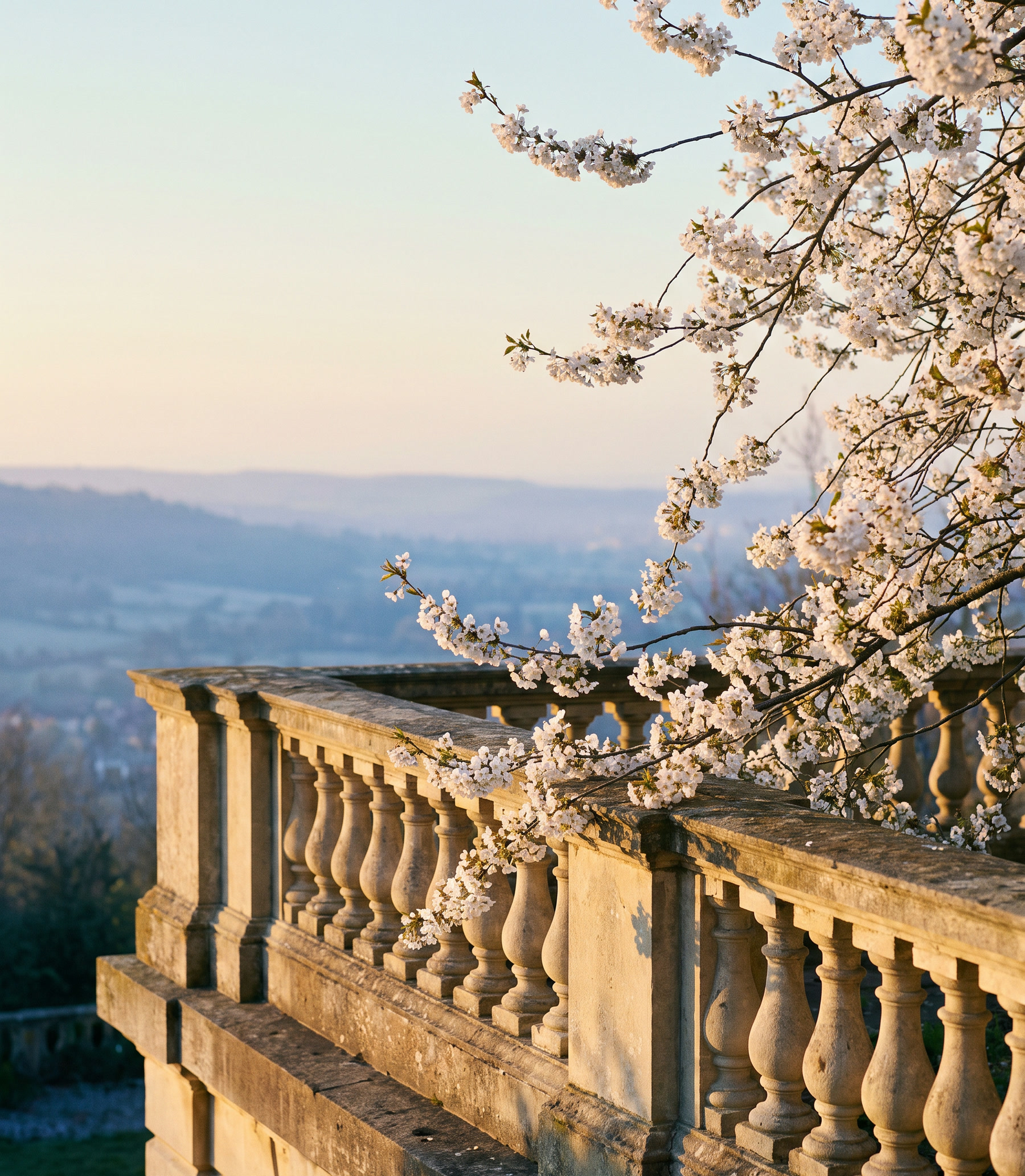 The stone terrace at dawn, looking over the valley